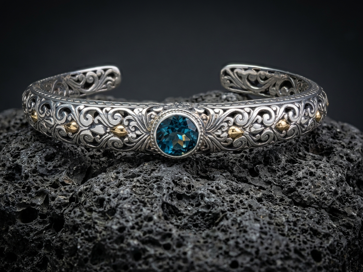Sterling Silver Yvette London Blue Topaz open-work Bangle